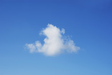 Scenic View Of White Cumulus Clouds Against Blue Sky