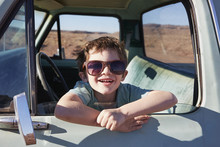 Portrait Of Smiling Boy Sitting In Pick-up Truck, , Arizona, USA