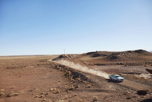 Pick Up Truck On Dusty Desert Road, Arizona, USA