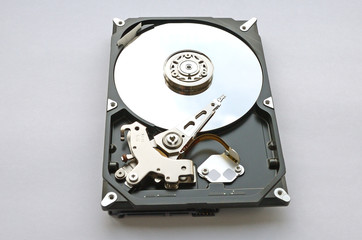 disassembled hard drive for computer on white background