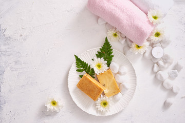 Wall Mural - close up of body care cosmetic products on stone table