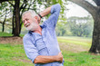 © TeTe Song - old age, health problem and people concept - senior man feeling sick at summer park
