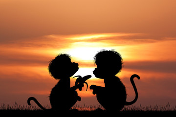 Poster - two monkeys with bananas at sunset