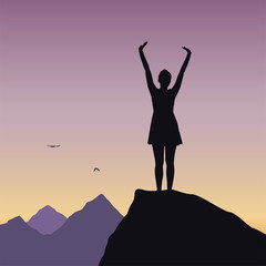 Wall Mural - young girl standing on rock and enjoying success in mountain landscape with flying birds