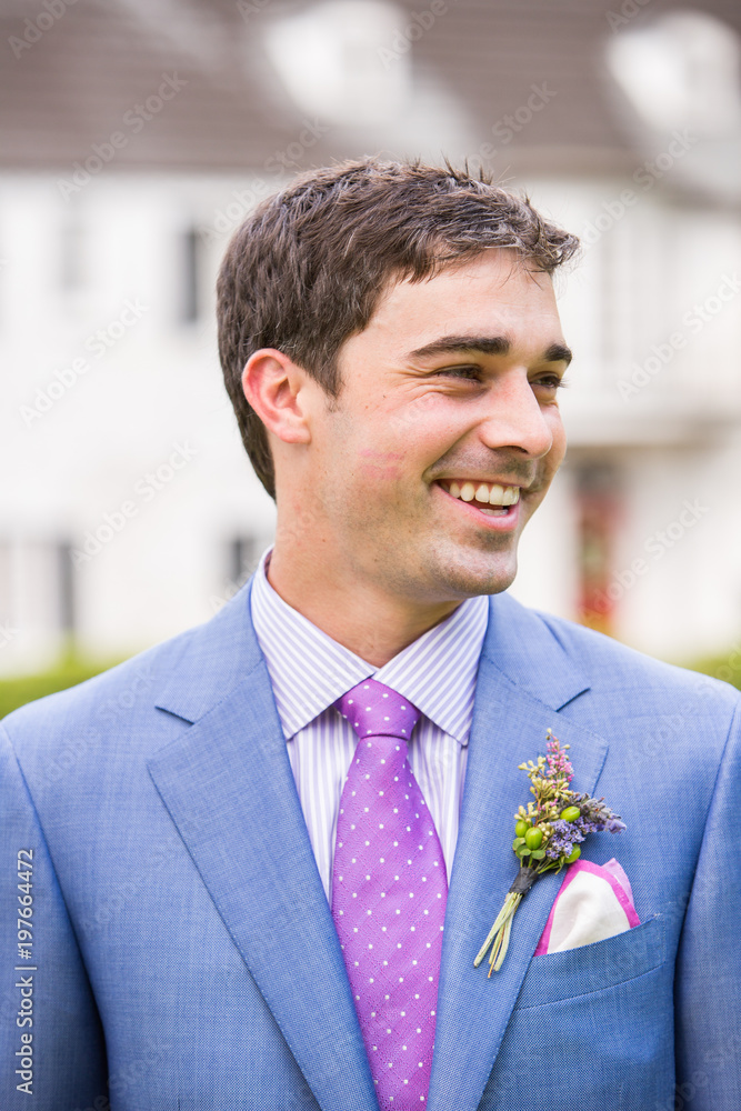 light blue suit purple tie