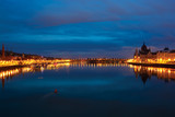 Fototapeta Miasto - Deep blue Danube river at night, highlighted shores. Budapest. Hungary
