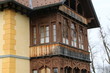Wood balcony at a historic building, verglaster Holz-Balkon an einem historischen Gebäude