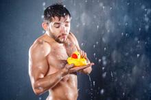 Attractive Nude Fit Adult Man Taking Shower And Playing With A Rubber Toy Duck