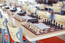 Chess Tournament Tables With Chess Timers And Blank Note Papers