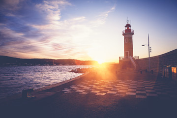 Wall Mural - Bright beautiful colorful sunset, Lighthouse in Saint Tropez, France, Cote d Azur, Provence