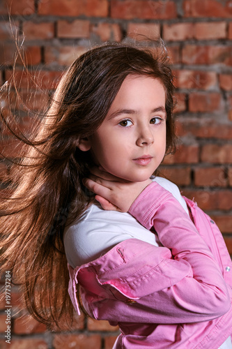 Portrait Closeup Young Girl Standing On Background Brick Wall