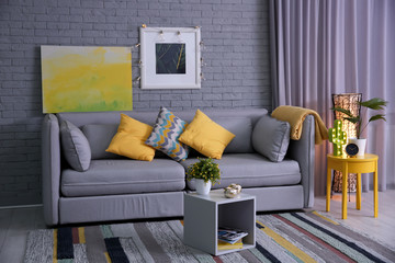 Wall Mural - Stylish living room interior with comfortable sofa