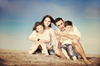 © .shock - happy young family have fun on beach