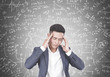 © ImageFlow - Stressed Asian businessman, science formula