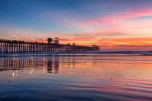 California Oceanside Pier Over The Ocean At Sunset With Beach, Travel Destination
