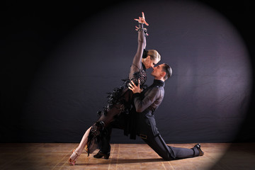 Wall Mural - dancers in ballroom isolated on black background