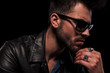 © Viorel Sima - close up of thoughtful fashion man with sunglasses