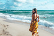 © Alena Ozerova - Boho girl walking on the beach
