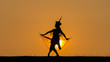 Manora dance (or Nora dance) silhouette with sun
