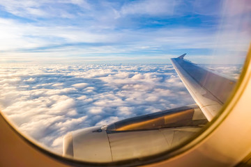 blue sky,sunshine and cloud outside of airplane window