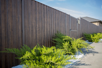 the fence around the private grounds