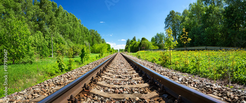 Fotomural Railway outdoors on beautiful summer day. Landscape with railroad