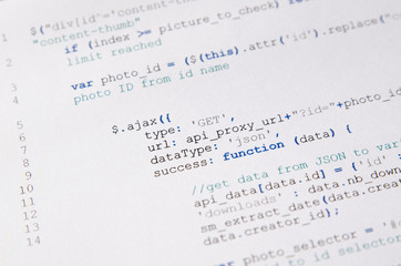 web developer programming code printed on a piece of paper
