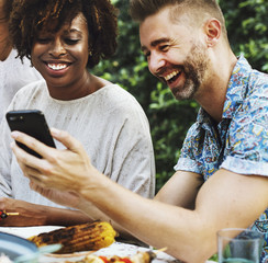 Wall Mural - Group of diverse friends enjoying summer party together