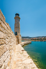 Wall Mural -  Lighthouse in old harbor in Rethymno, Crete, Greece