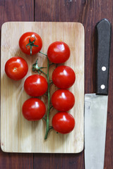 Wall Mural - Cherry tomatoes, healthy food, a kitchen board, cooking,