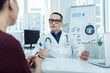 © Viacheslav Yakobchuk - Medical world. Professional doctor sitting at the table and talking to her patient