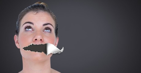 Wall Mural - Woman with torn paper on mouth