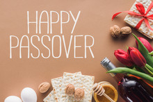 Top View Of Happy Passover Greeting And Matza On Brown, Passover Tale Concept