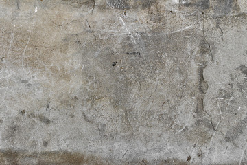 Gray old plaster closeup. Old gray wall background. Old wall. Grey plaster