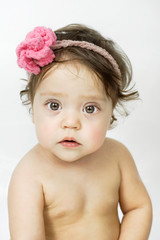 little girl with flowers on her head