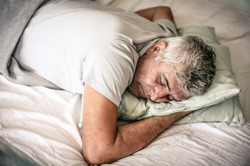 Wall Mural - Sleepy senior man.