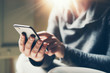 © Rymden - Young man with smartphone