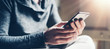 © Rymden - Young man with smartphone