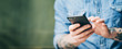 © Rymden - Young man with smartphone