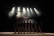 © nagaets - Ballet class on the stage of the theater with light and smoke. Children are engaged in classical exercise on stage.