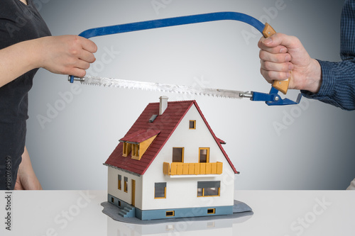 Cuadros en Lienzo Divorce and dividing a house concept