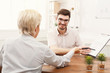 © Prostock-studio - Couple of young colleagues working at modern office