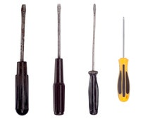 Set of old screwdrivers on a white background