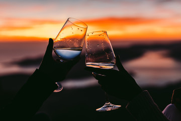 drinking wine at sunset