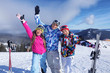 © Africa Studio - Happy friends on ski piste at snowy resort. Winter vacation