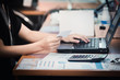 © chaiya - Business woman hands holding credit card and using laptop for online shopping. Online shopping concept.