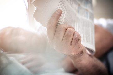 Wall Mural - News paper in hand.