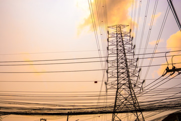 Electricity concept. Close up high voltage power lines station.