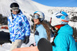 © Africa Studio - Group of snowboarders on ski piste at snowy resort. Winter vacation