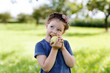 © Irina Schmidt - Adorable little preschool kid girl eating green apple on organic farm